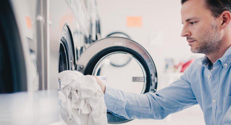 Was ist der Unterschied zwischen den Einstellungen "Baumwolle/normal" und "Dauerdruck" bei einer Waschmaschine?