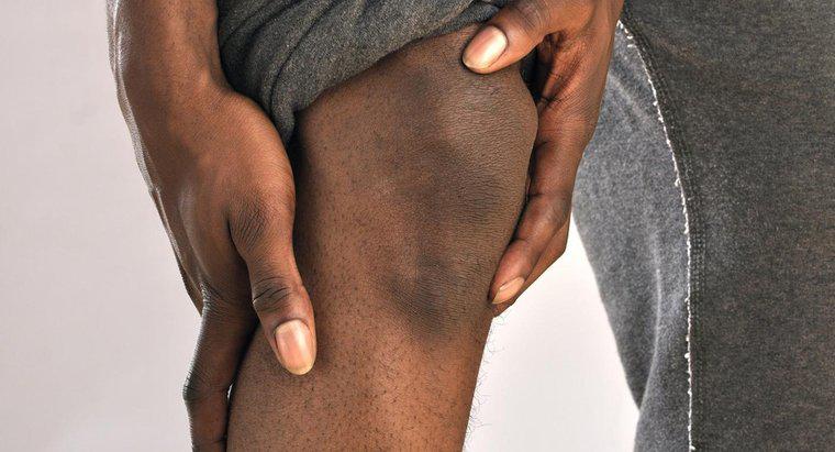 Was sind einige Ursachen für stechende Schmerzen in der Kniescheibe?