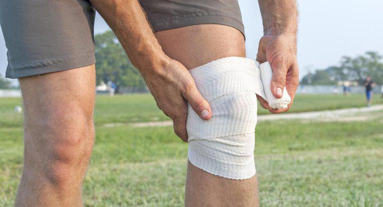 Was sind die Symptome eines Kniebandrisses?