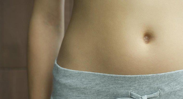 Was verursacht Schmerzen um den Bauchnabel und ist es ein Zeichen für eine Schwangerschaft?