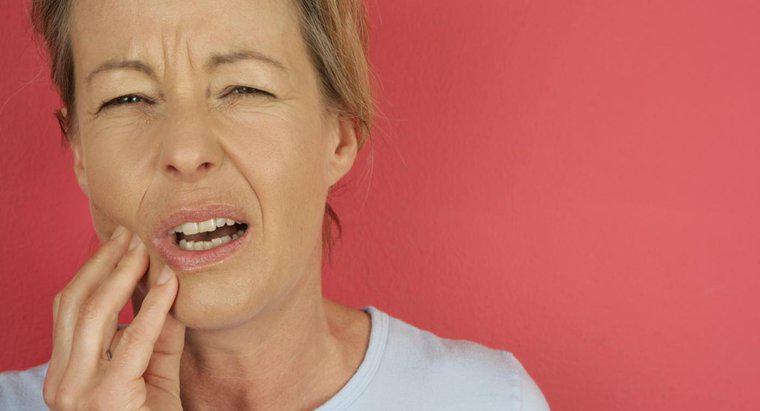 Was kann Zahnschmerzen beim Beißen verursachen?